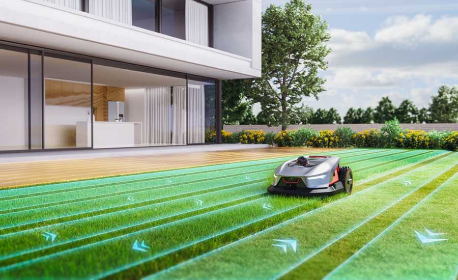 Robot tondeuse dans un jardin