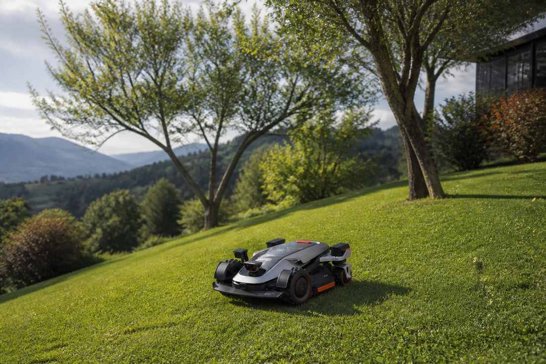 sunseeker elite x9 robot mower grassy hillside