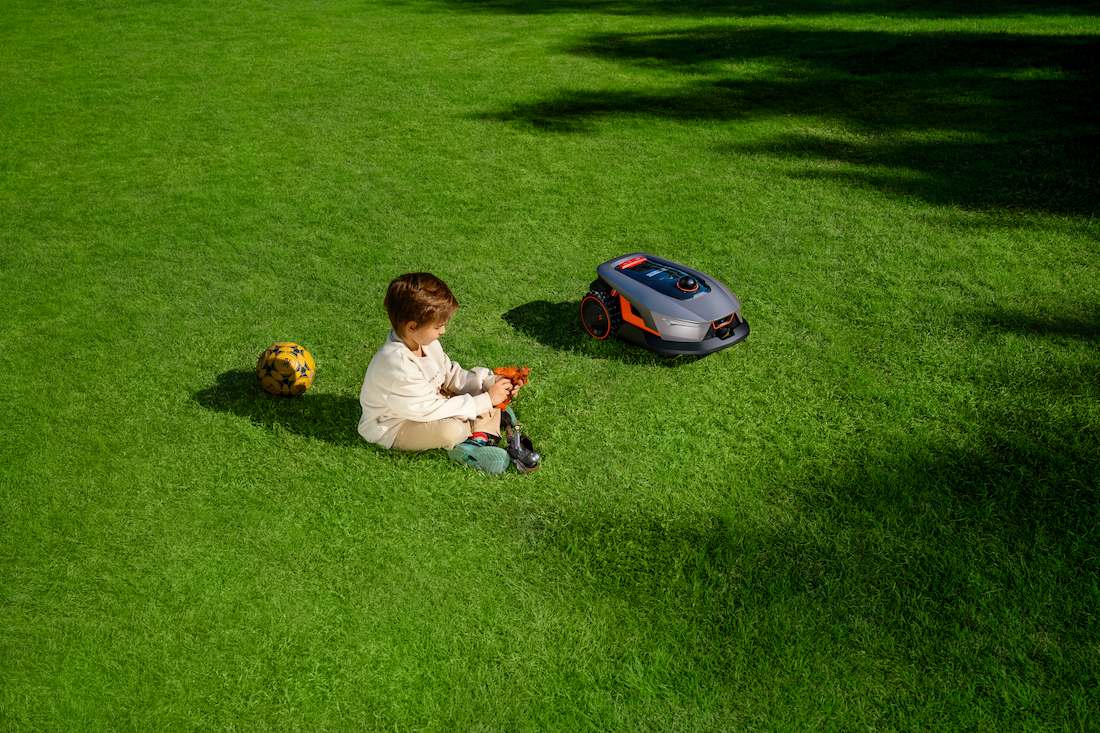 Robotic Lawn Mower In Garden
