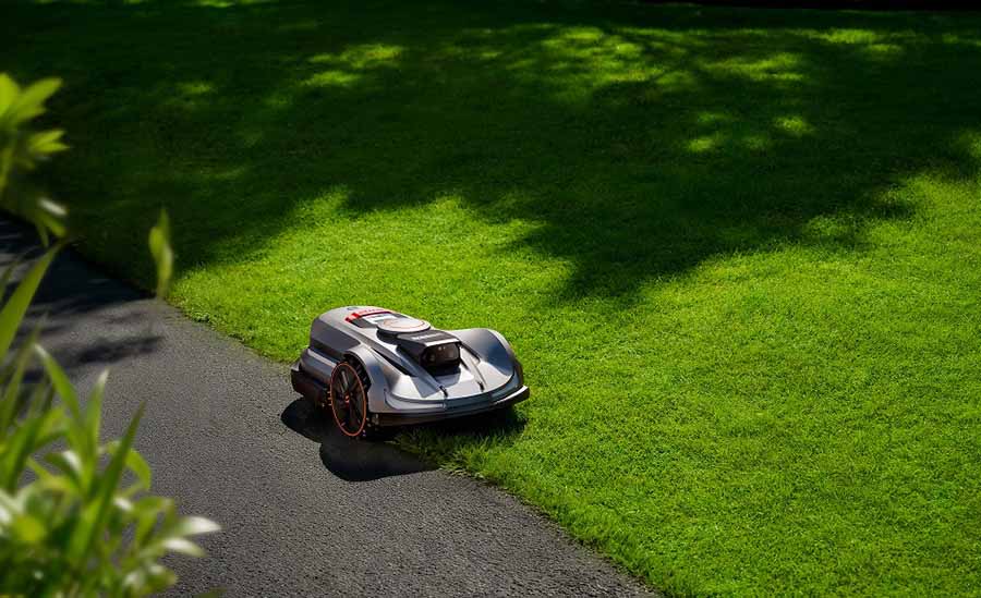 Robotic Lawn Mower On Grass