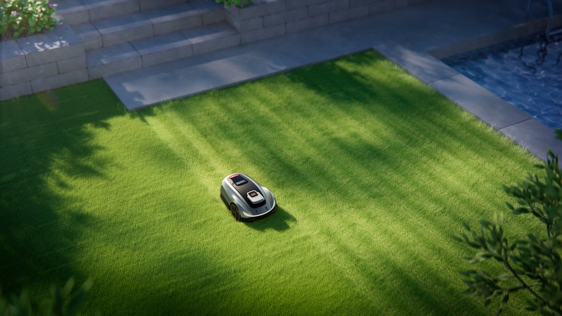 Robotic Lawn Mower On Grass