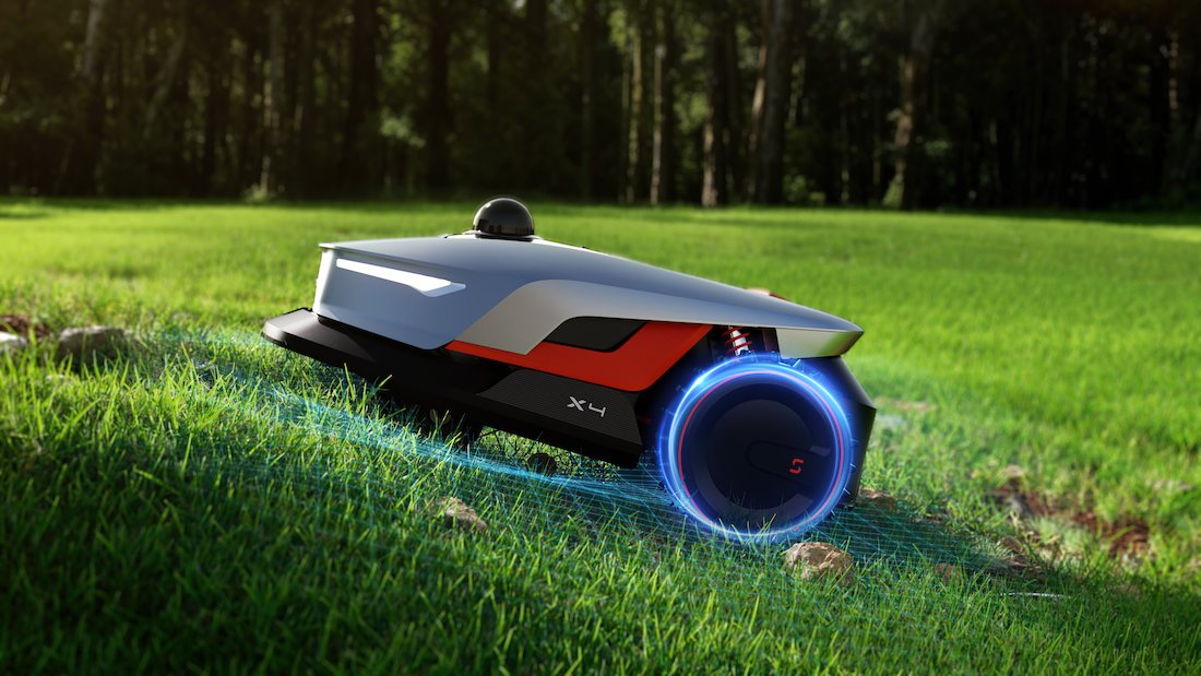 robotic mower preparing grass for overseeding a lawn