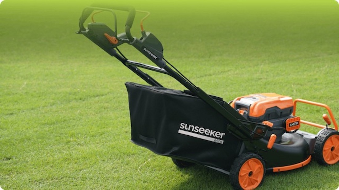 Electric Lawn Mower on Grass