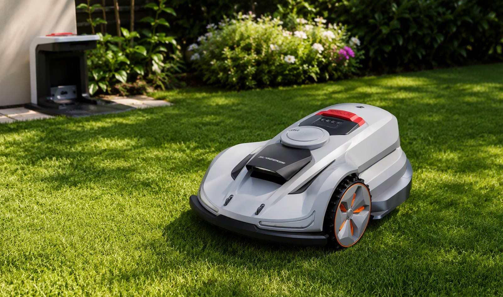 Sunseeker robot lawn mower mowing automatically near its charging dock